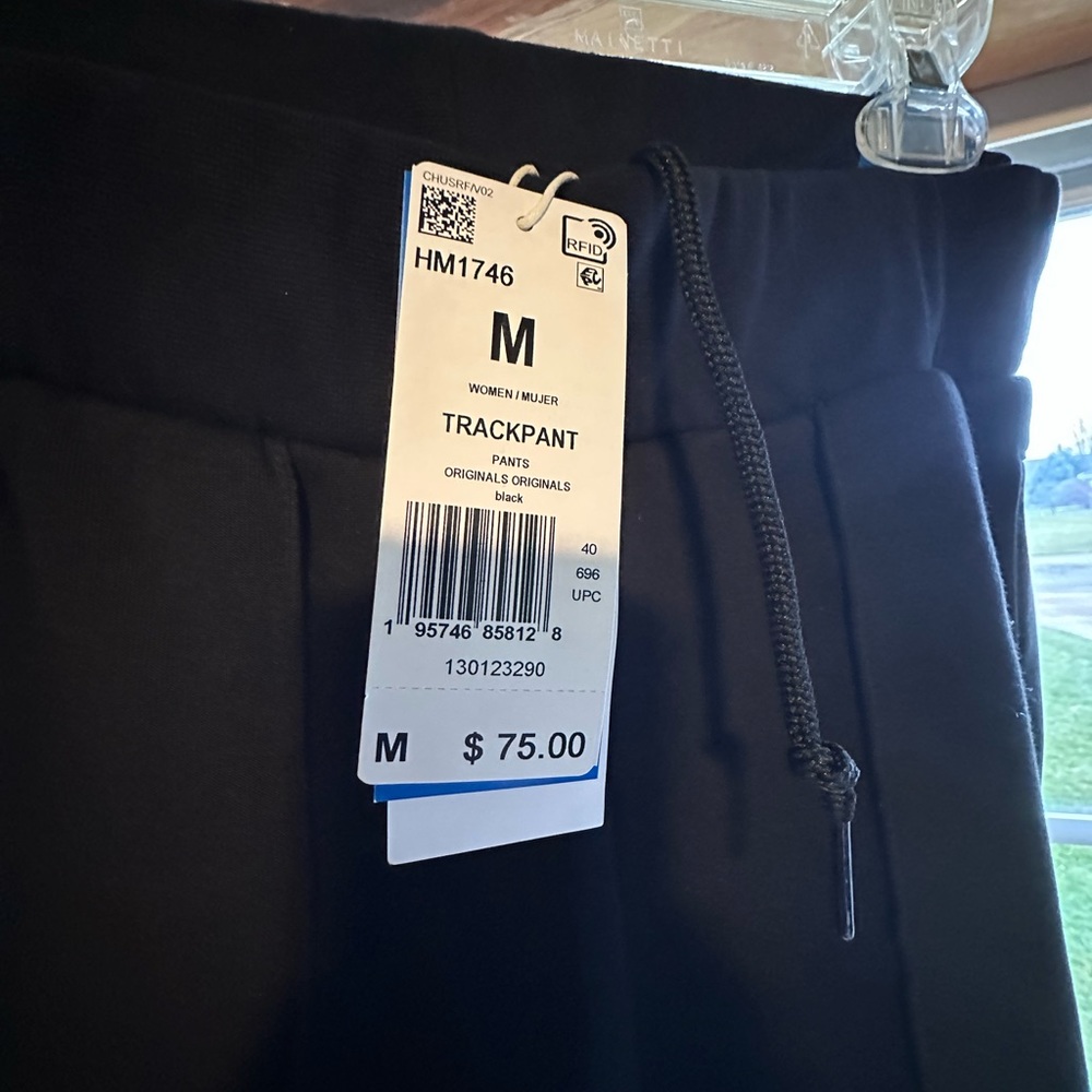 Black brand new adidas track pant.